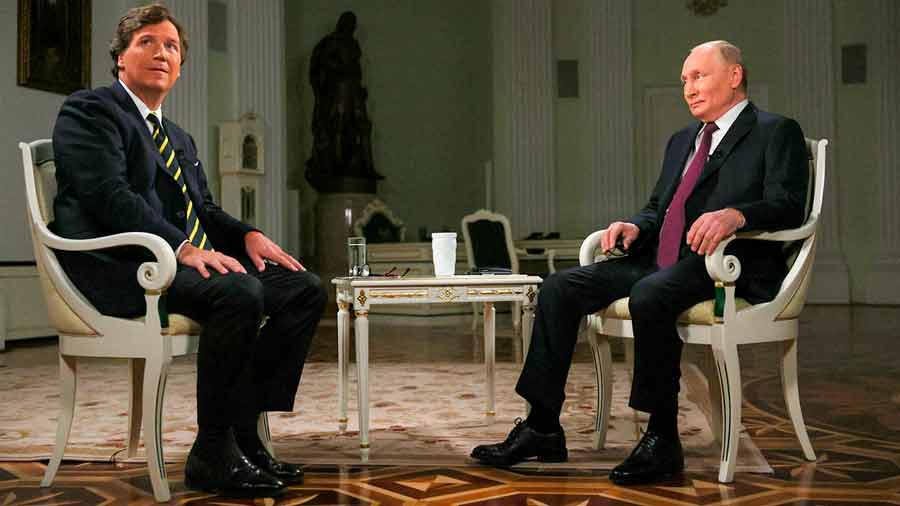 Periodista Carlson y presidente Putin 